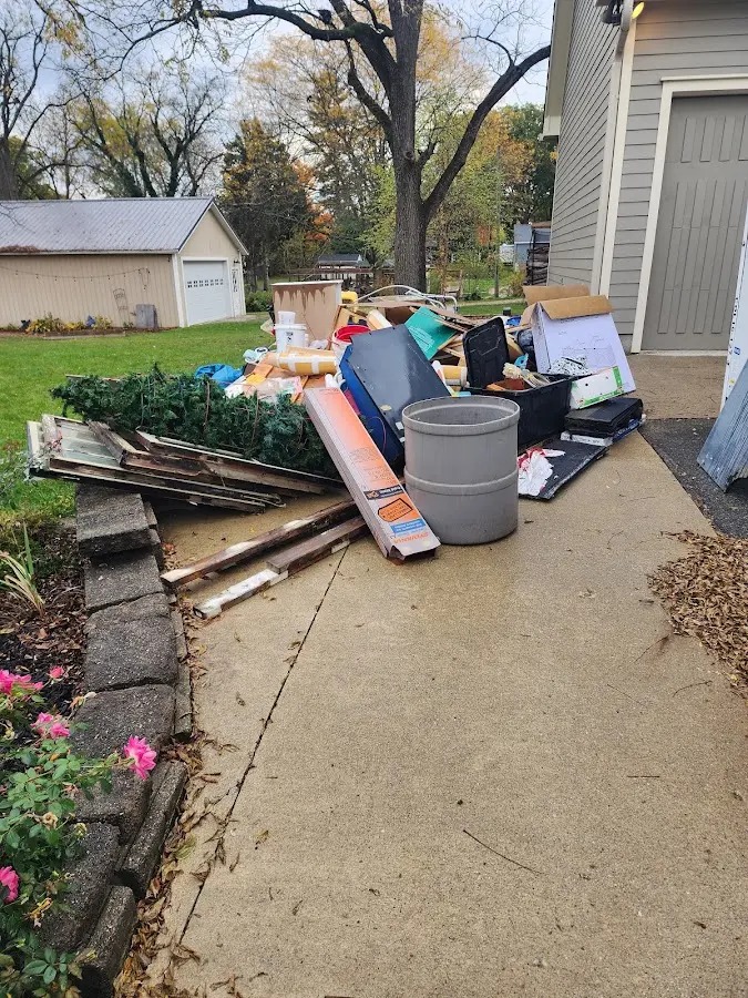 Dumpster being loaded with debris for 30 Yard Dumpster Rental in Matawan